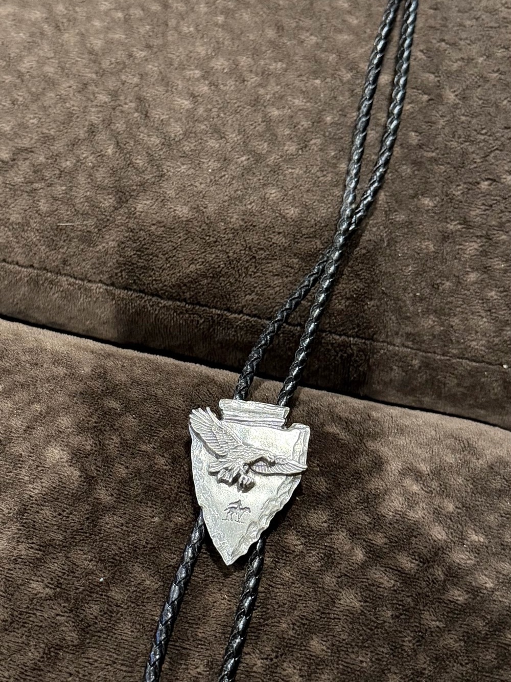 Black Braided Bolo Tie with Silver Eagle Arrowhead Pendant